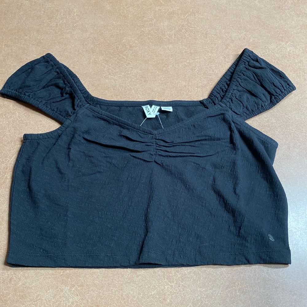 Roxy black crop top. Unworn, tags still on.